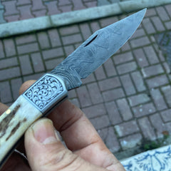 Stag Handle Engraved Damascus Folding Knife