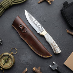 Cuchillo grabado con mango de ciervo